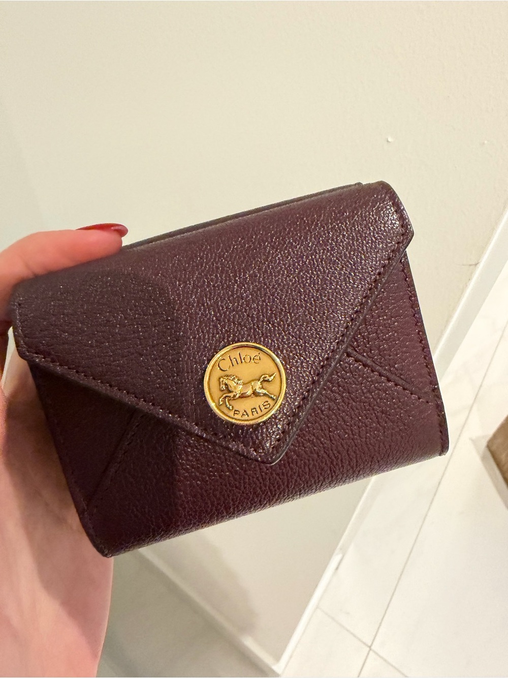 Chloé Burgundy Leather Compact Wallet with Gold Medallion